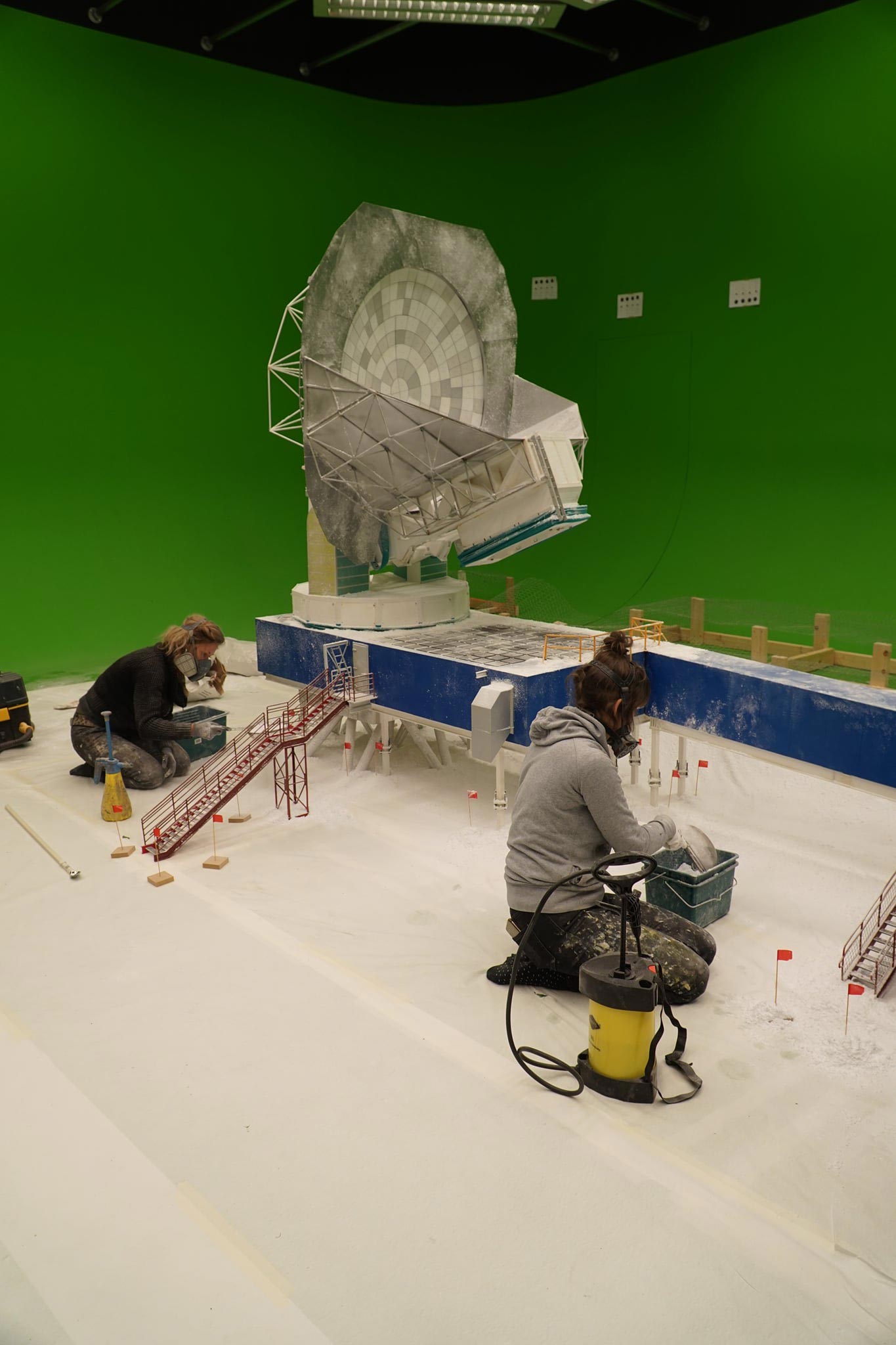 E&S effects technicians work on a scale model of the South Pole Telescope for the fulldome show Black Hole First Picture